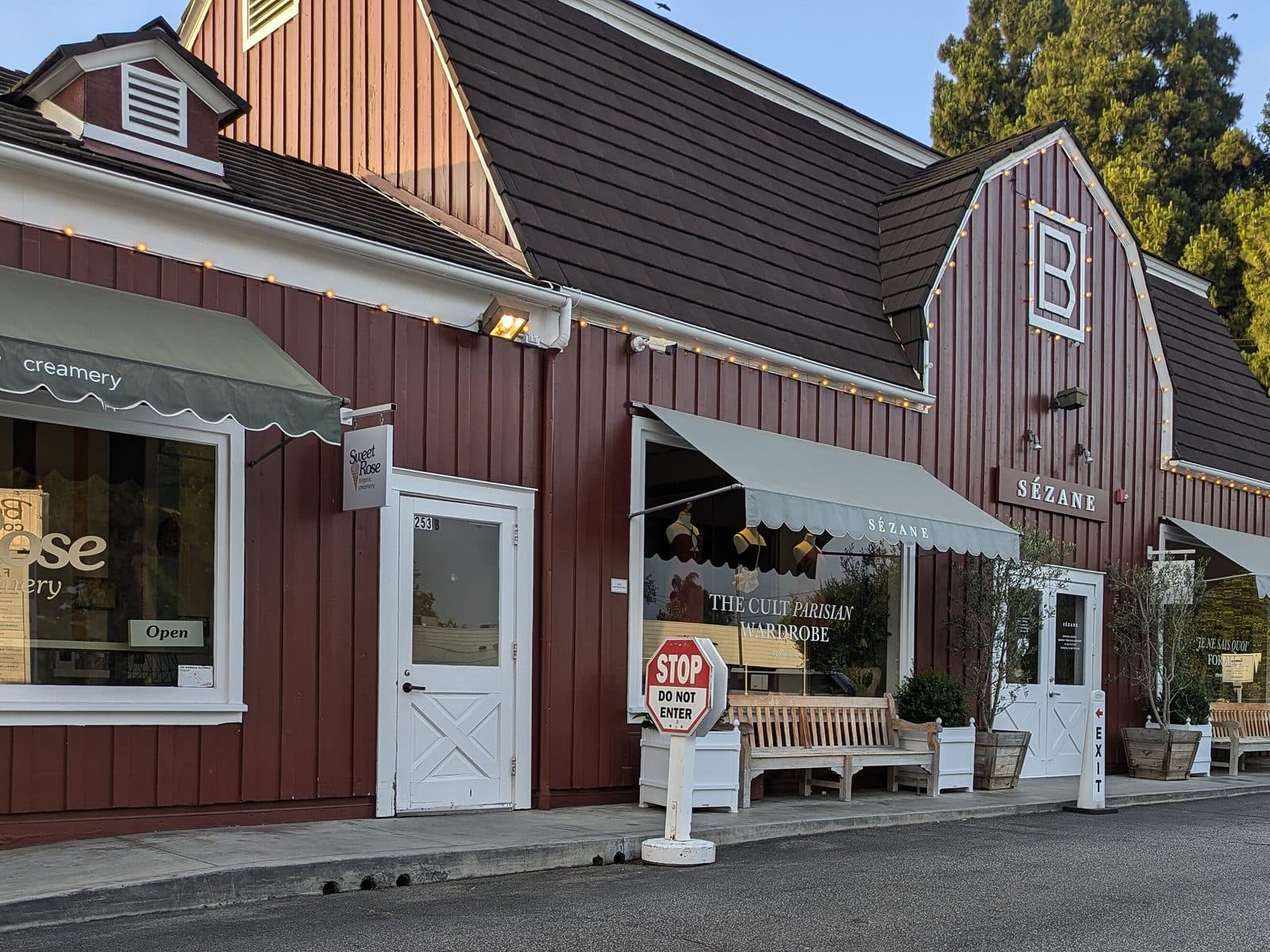 The red barn-style shops of the Brentwood Country Mart on 26th Street in Brentwood, Los Angeles