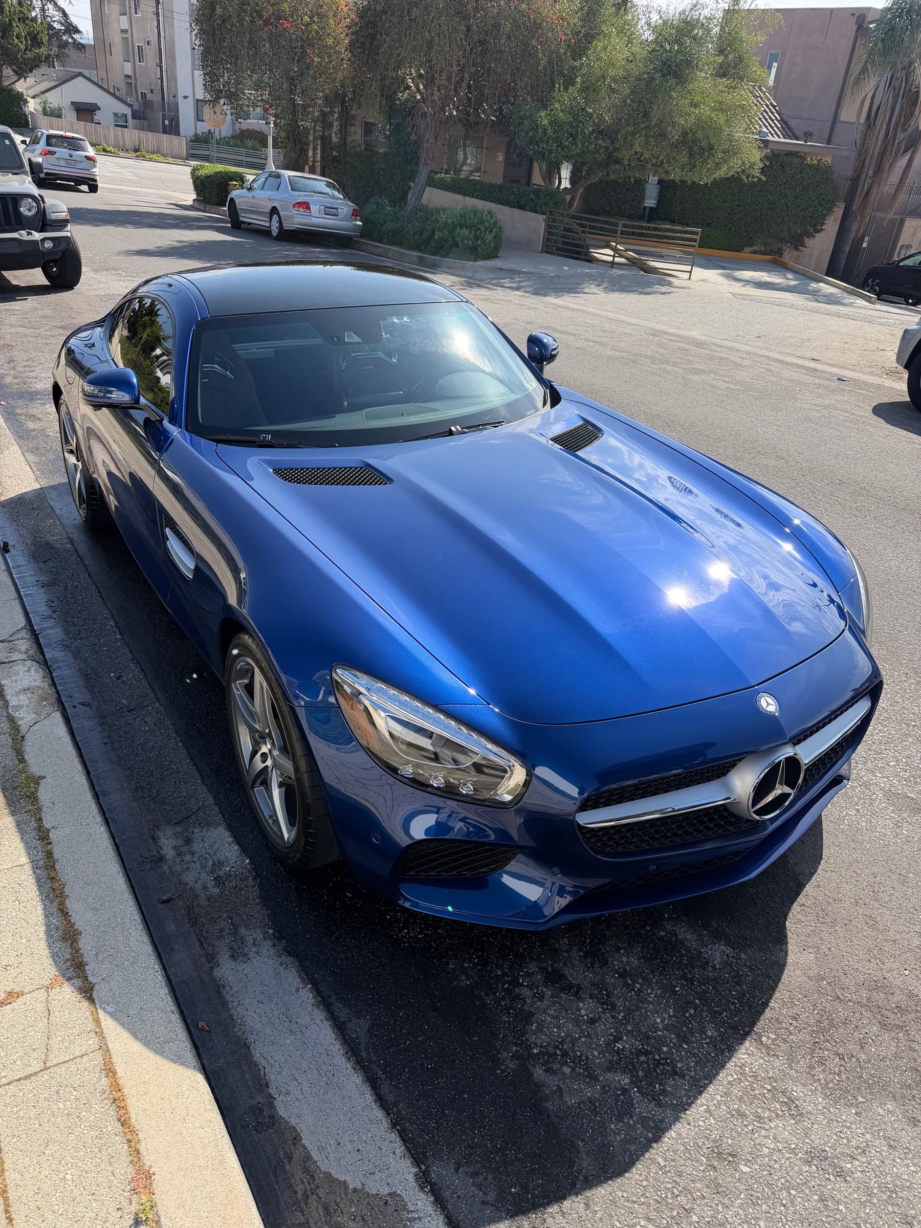 The same Mercedes-AMG GT finished, with a deep glossy exterior shine