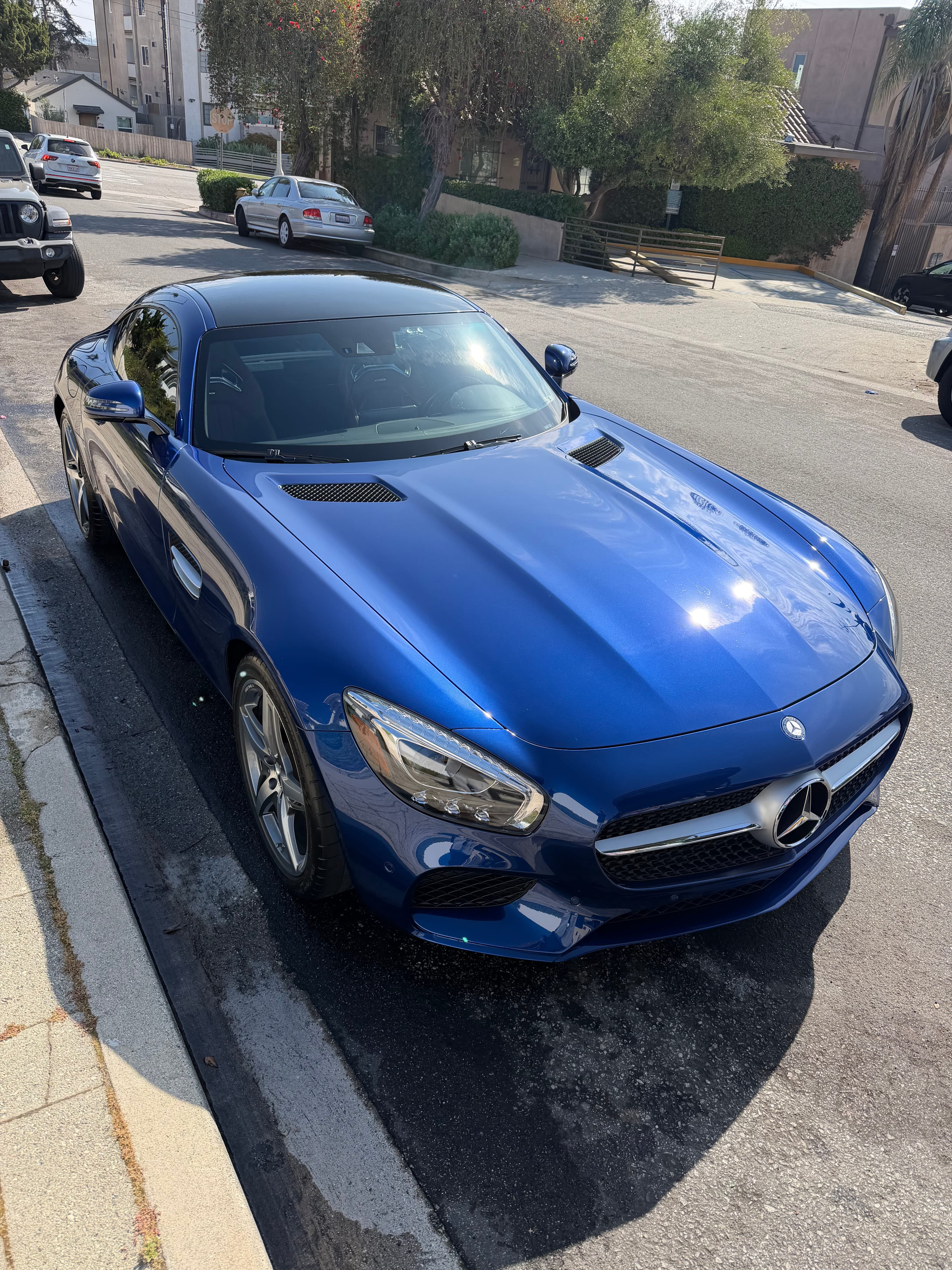 The same Mercedes-AMG GT finished, with a deep glossy exterior shine